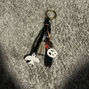 Tory Burch Peace themed Tassel Key Ring with charms